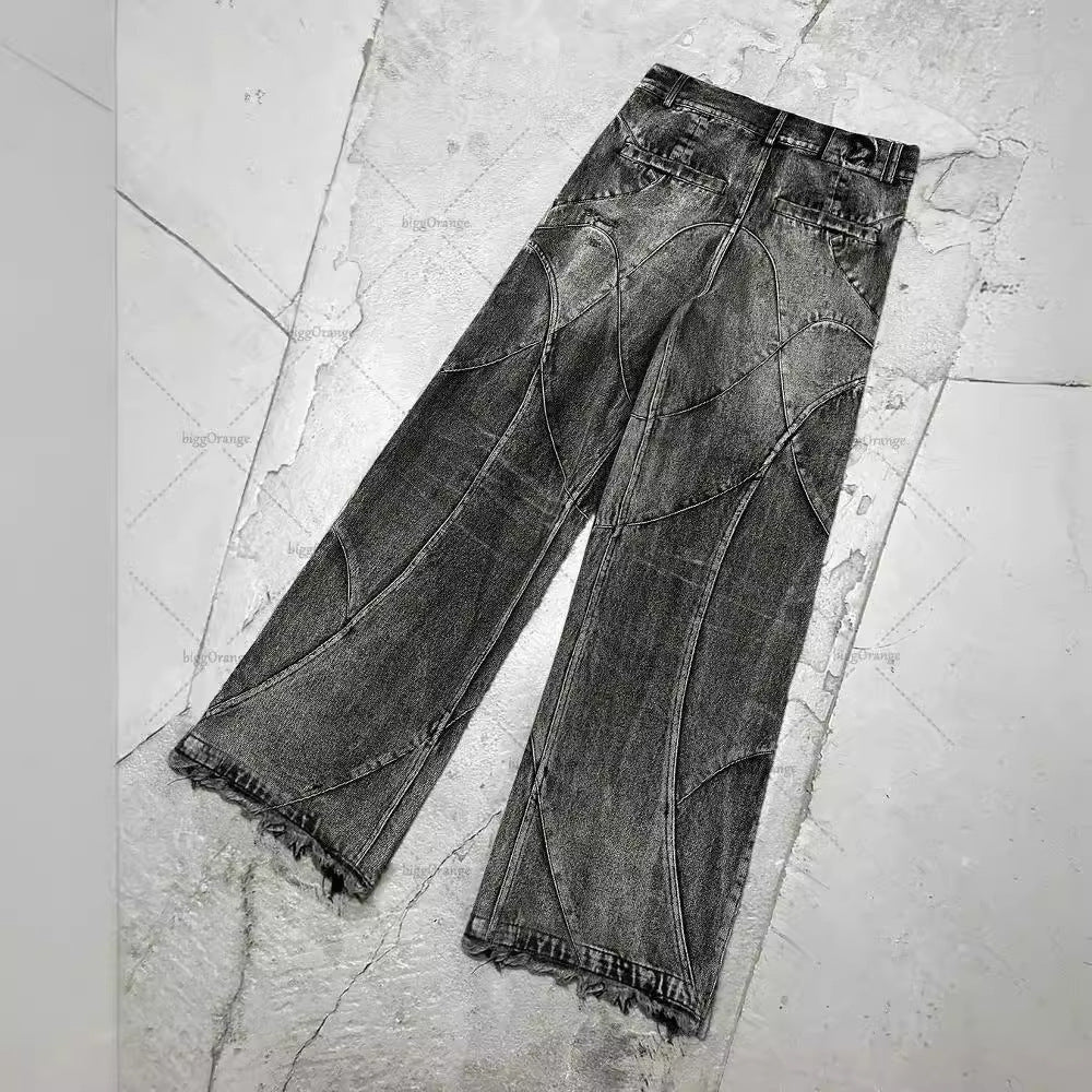 Vaezion Shop men's designer streetwear jeans in washed black with abstract stitching