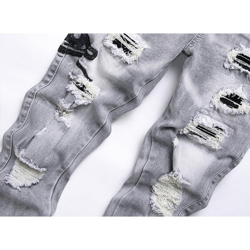 VAEZION Ripped Embroidered Jeans