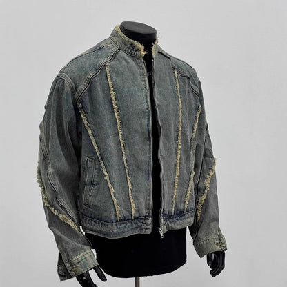 Men's distressed denim jacket with raw edge seams on mannequin, Vaezion streetwear style