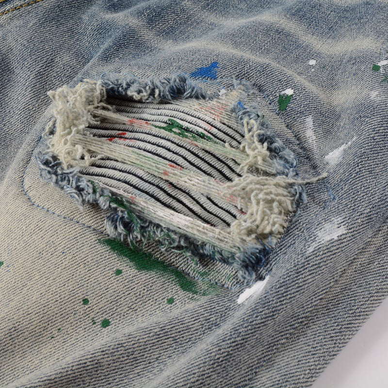 Distressed Patch Slim Denim Jeans