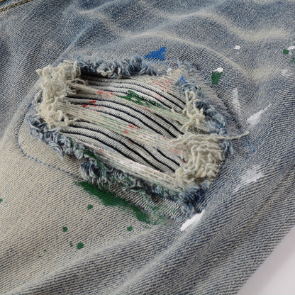 Distressed Patch Slim Denim Jeans