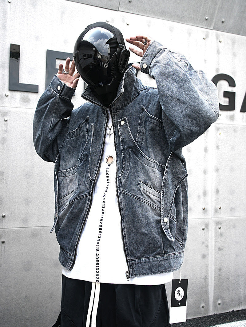 Man in an oversized denim jacket and futuristic black helmet, streetwear look at Vaezion Shop