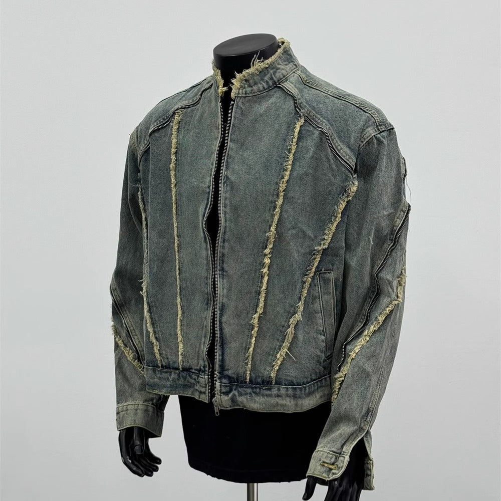 Distressed denim jacket with frayed seams, luxury streetwear style, displayed on mannequin