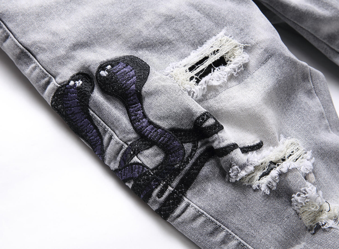 VAEZION Ripped Embroidered Jeans